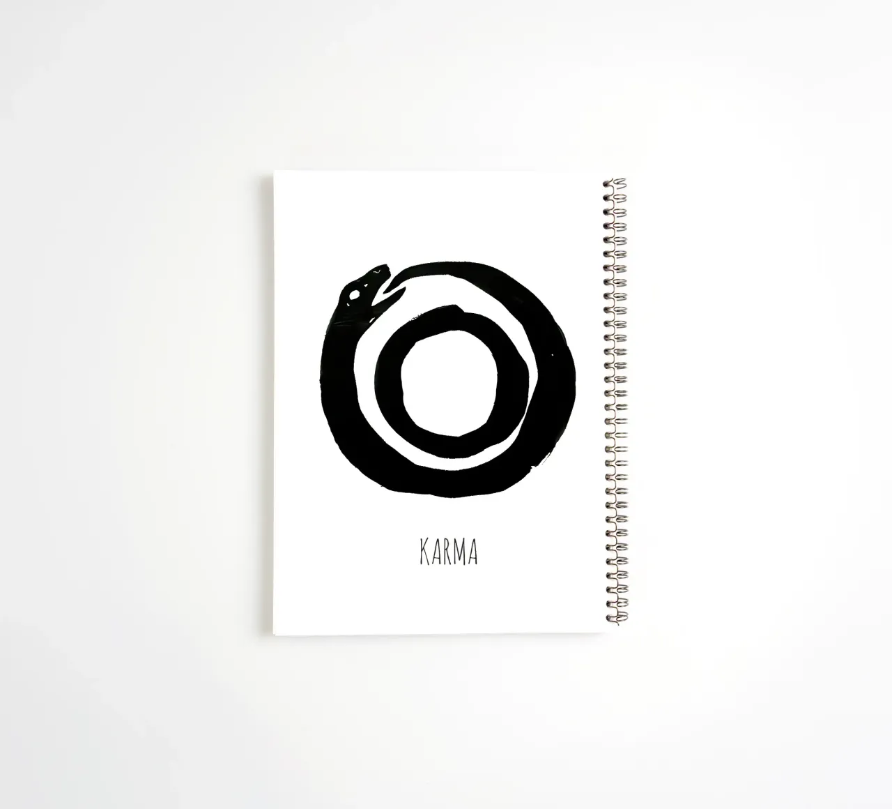 Karma is a full Circle spiral notebook by Attaboy Dsgn