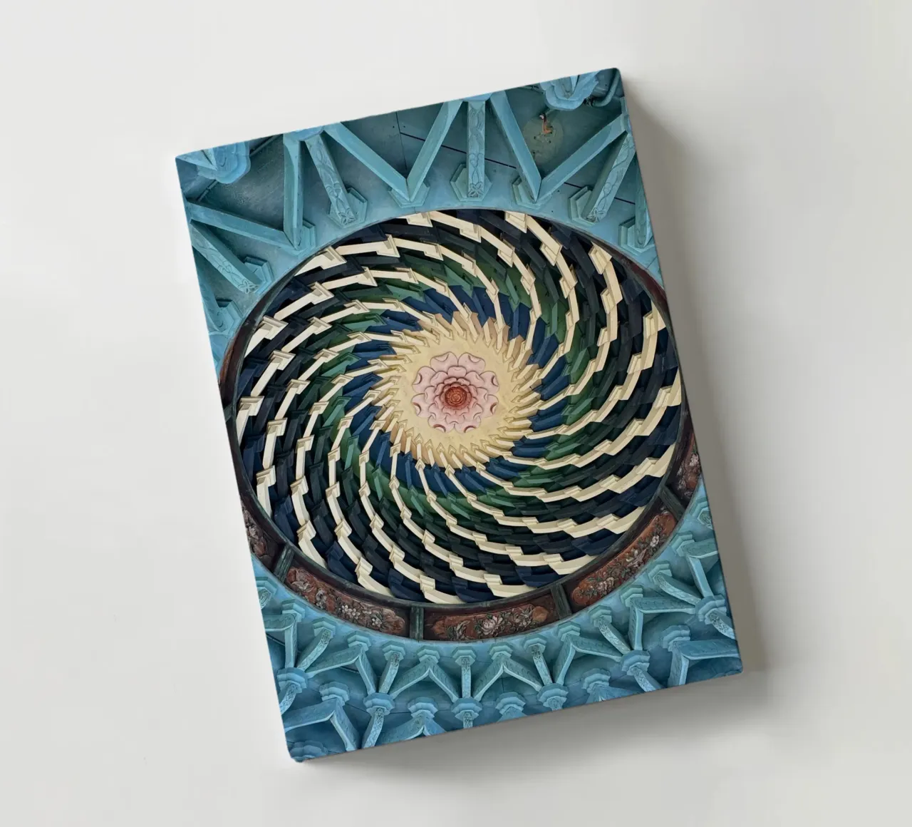 Vibrant spiral pattern on ceiling of a Japanese temple notebook by byrieneke