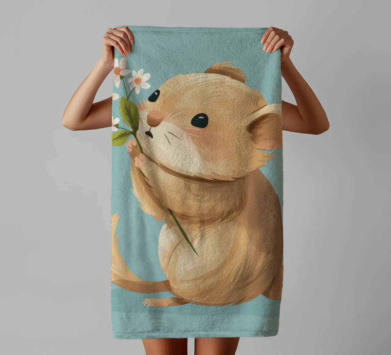 Piccola creatura che tiene in mano un fiore con un'espressione gentile asciugamano da bagno da DesignDoodle