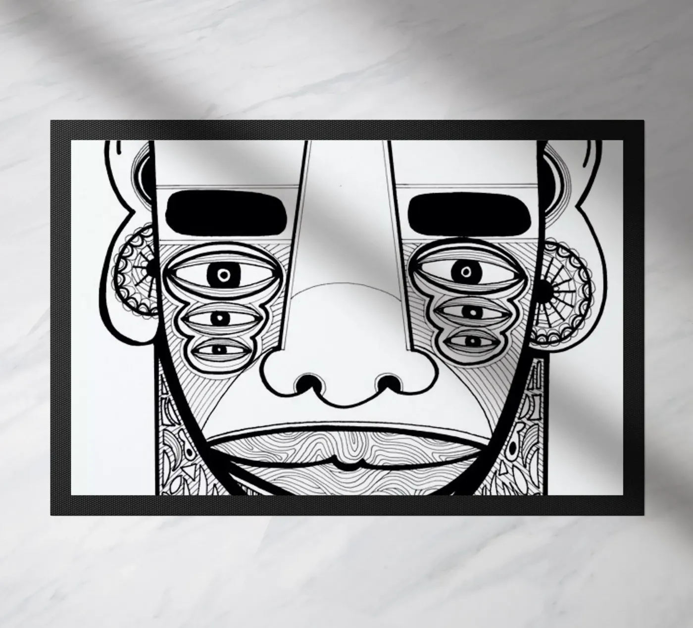 mask 1 deurmat van Studio Teer