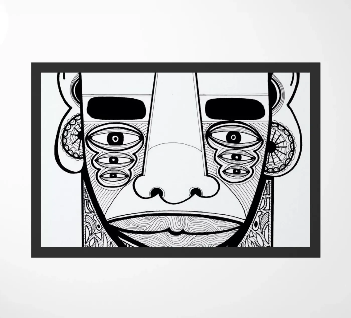 mask 1 deurmat van Studio Teer