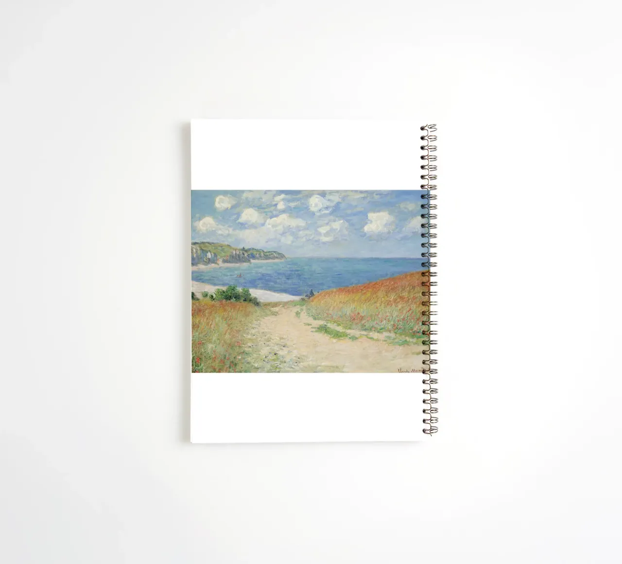 a road leading through wheat fields to cliffs and the sea spiral notebook by SMG Store