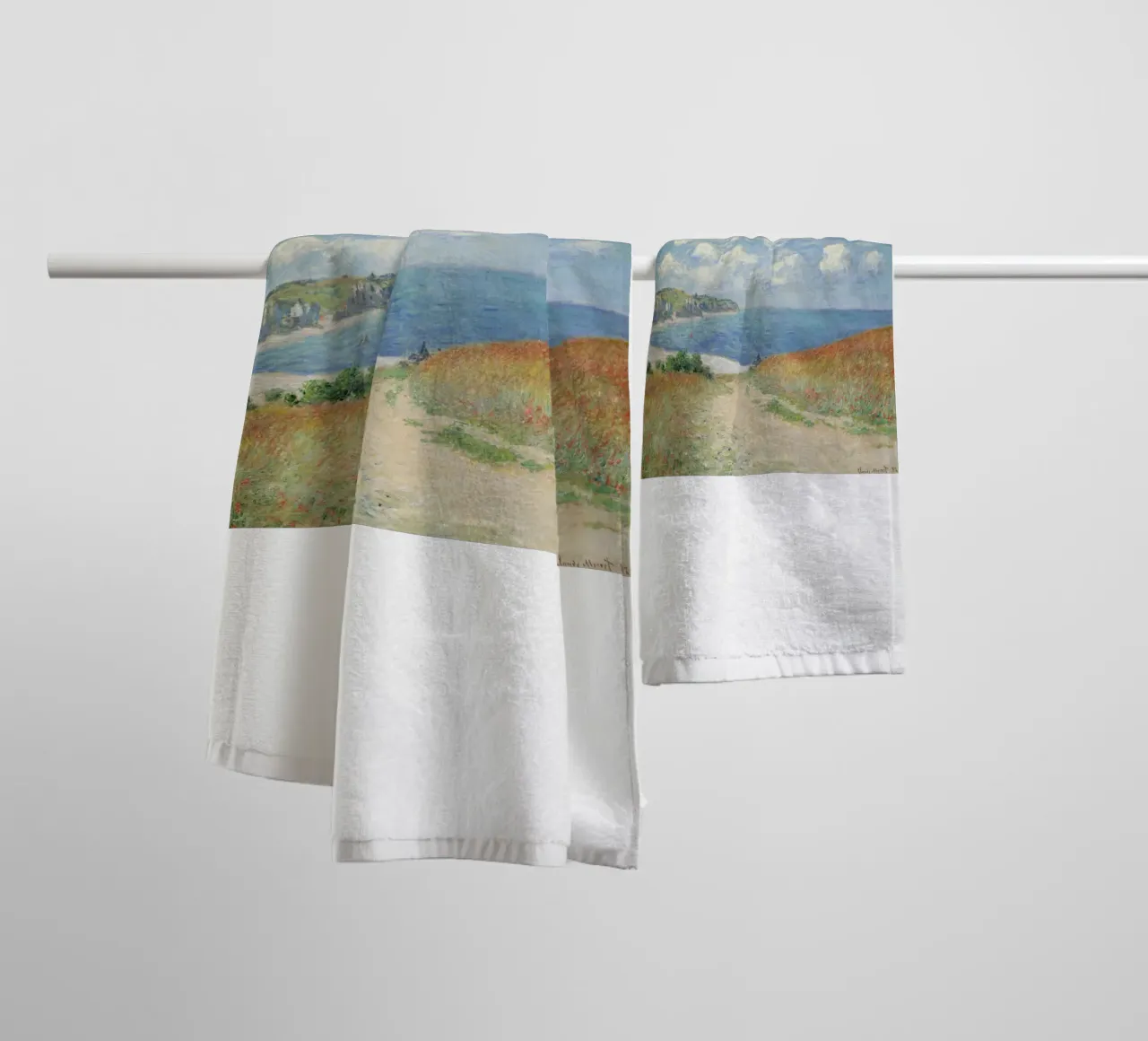a road leading through wheat fields to cliffs and the sea towel by SMG Store