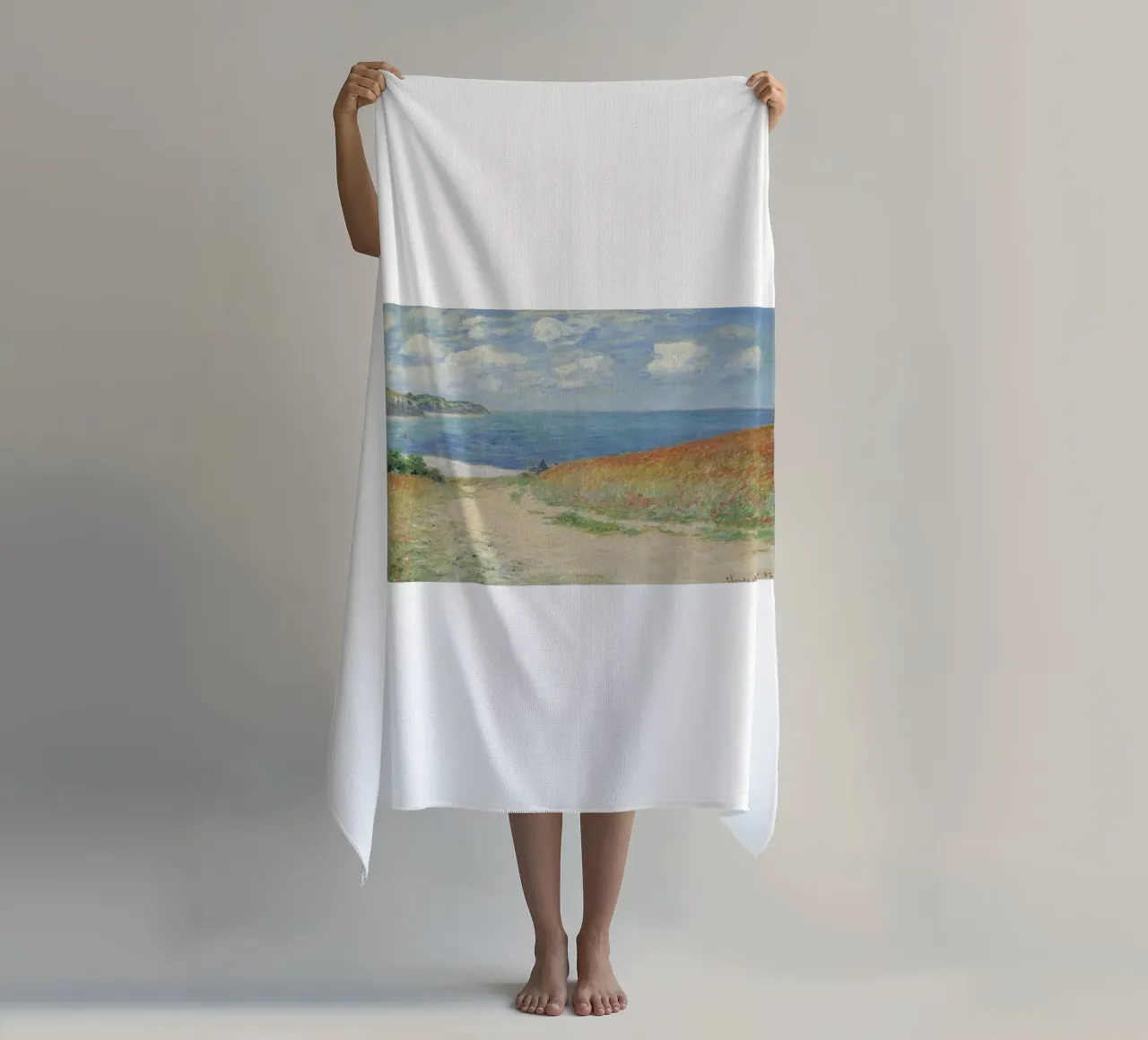 a road leading through wheat fields to cliffs and the sea beach towel by SMG Store