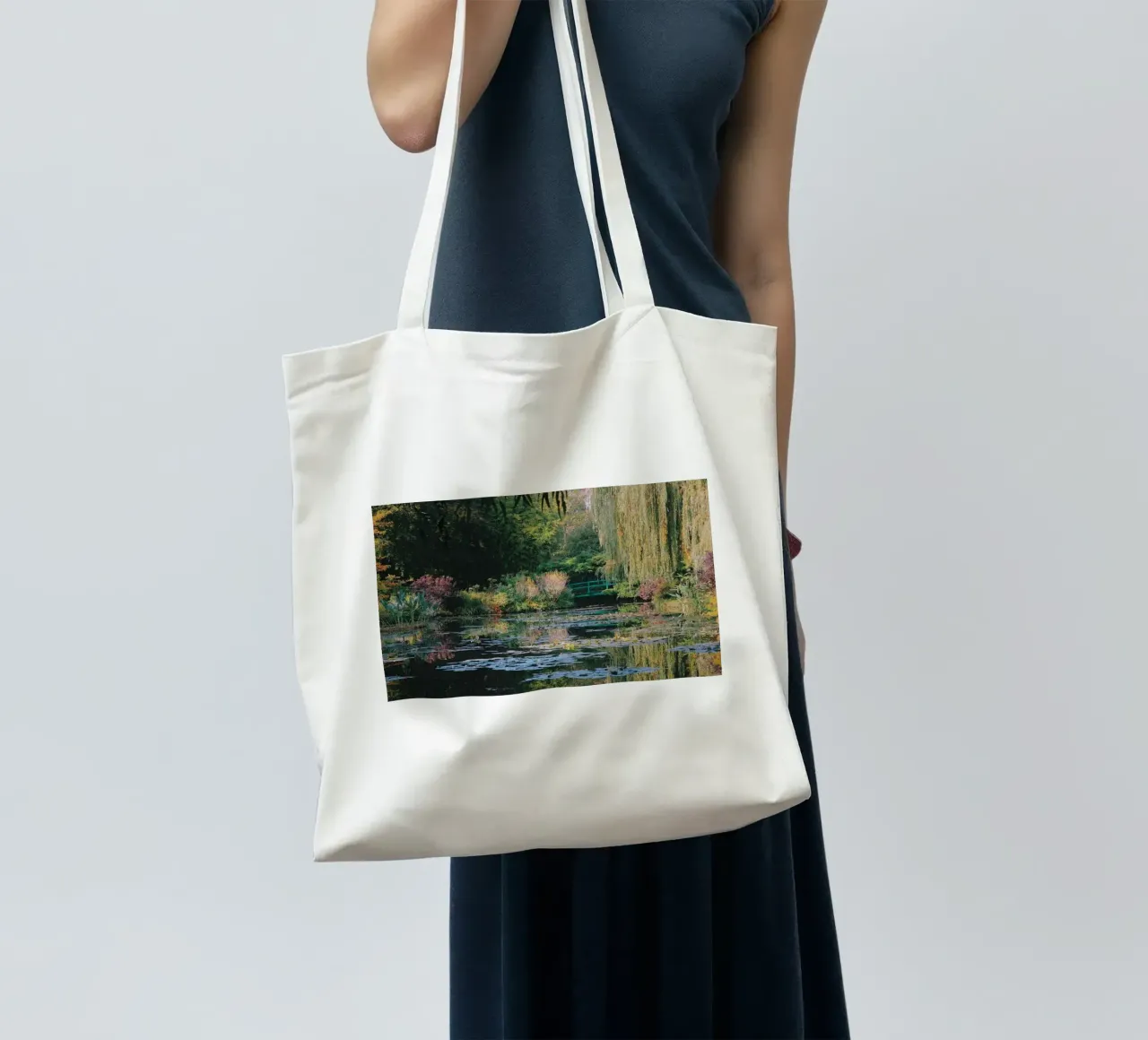 lotus pond with curved bridge tote bag by SMG Store