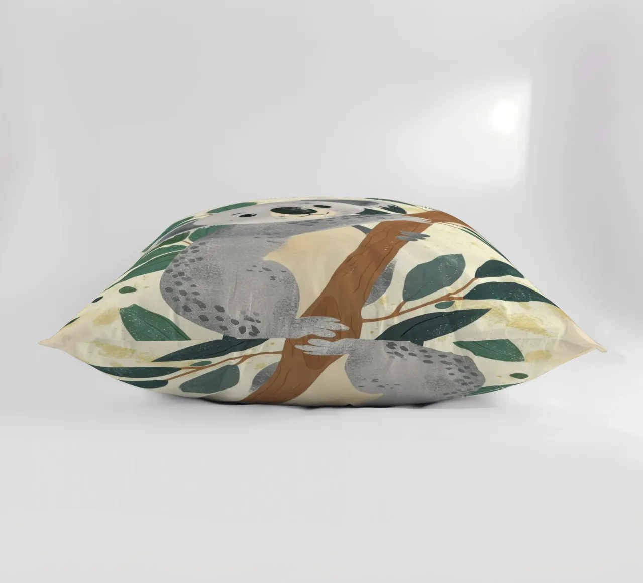 Cute koala climbing a tree with green leaves in a light-tone decorative cushion by DesignDoodle