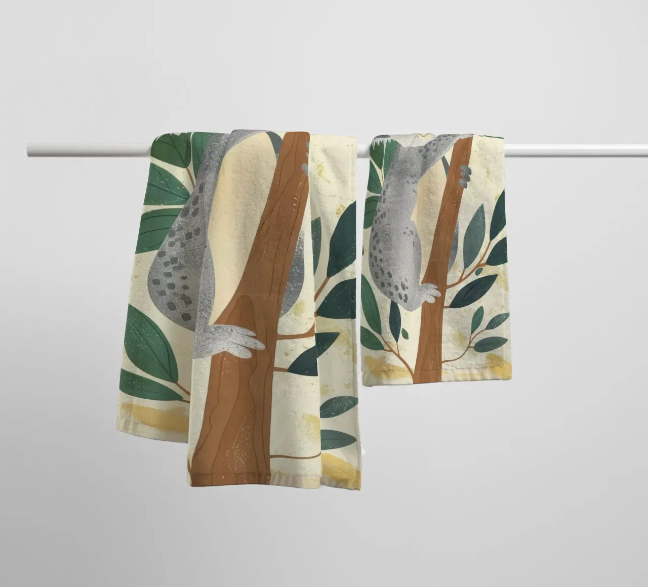 Cute koala climbing a tree with green leaves in a light-tone towel by DesignDoodle