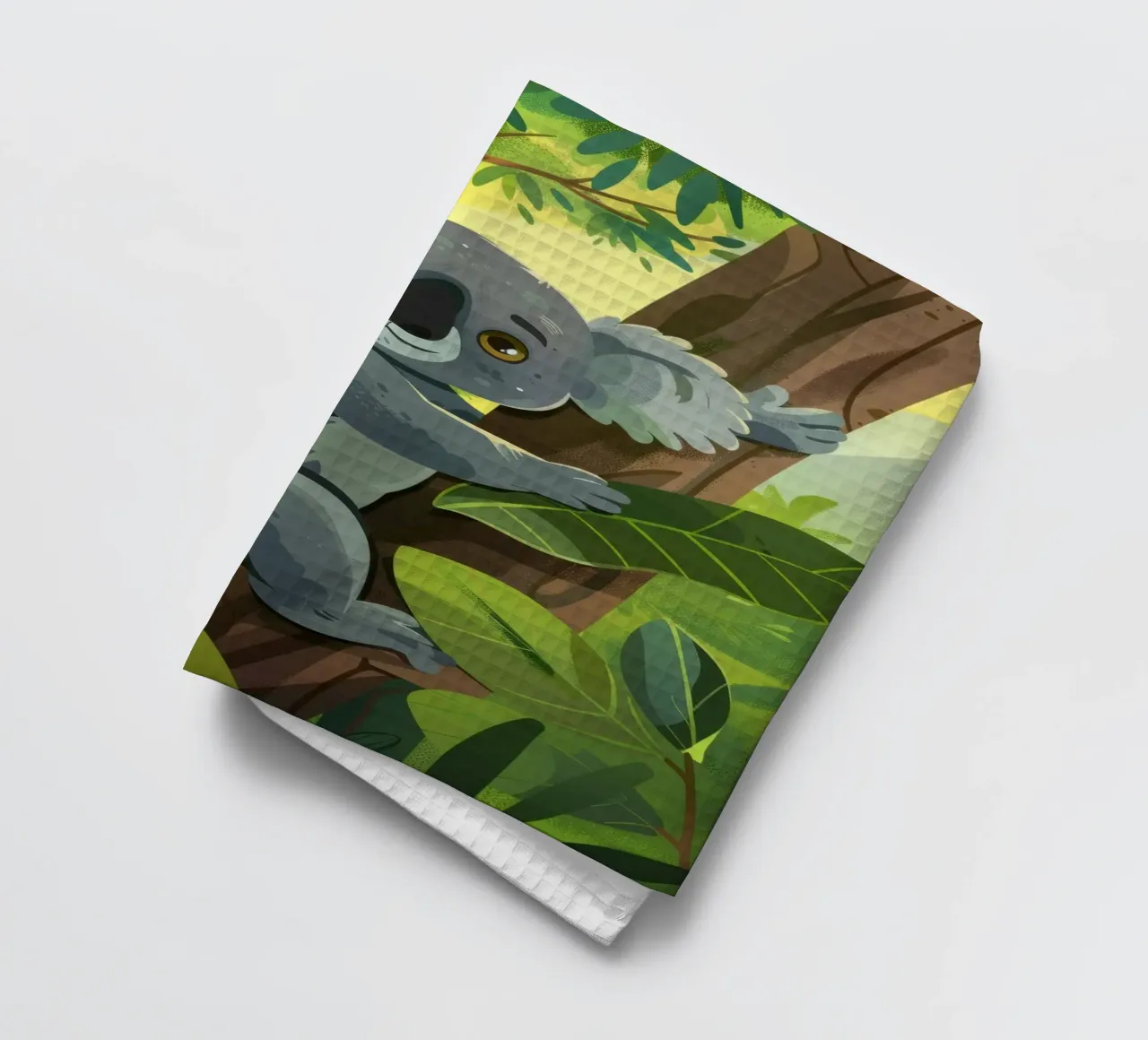 Koala climbing a tree in a lush forest landscape during the tea towel by DesignDoodle