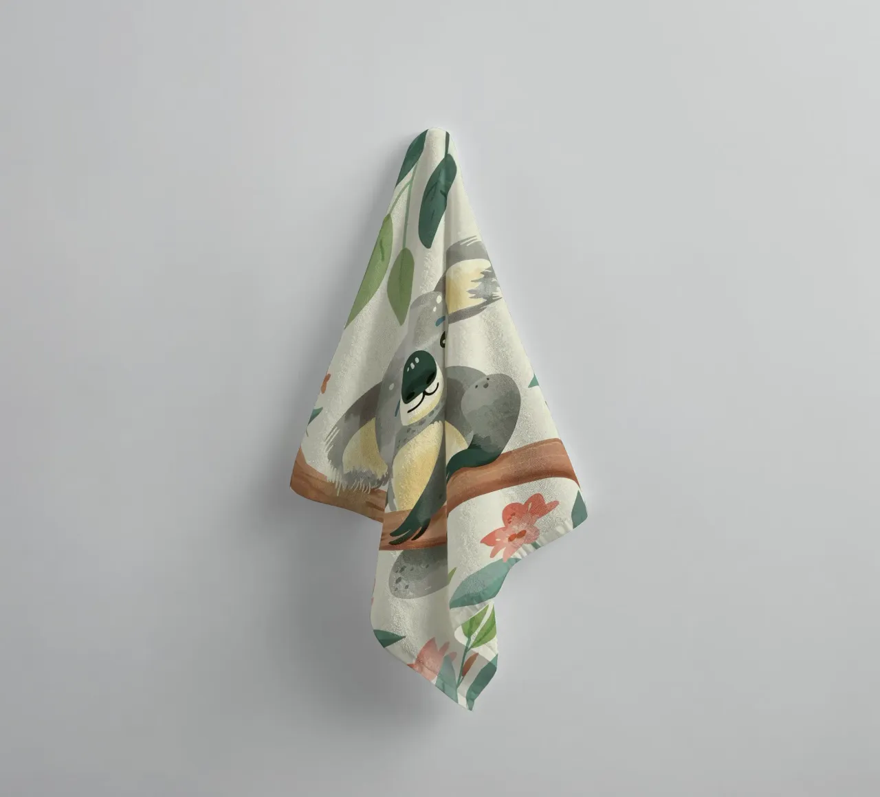 Cute koala resting on a tree branch surrounded by leaves towel by DesignDoodle
