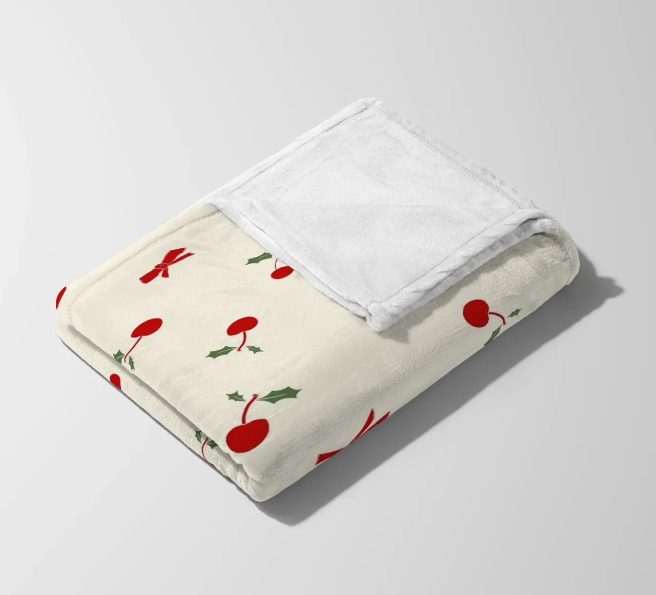 Piccolo motivo natalizio a fiori e ciliegie coperta in pile da gulsengunel