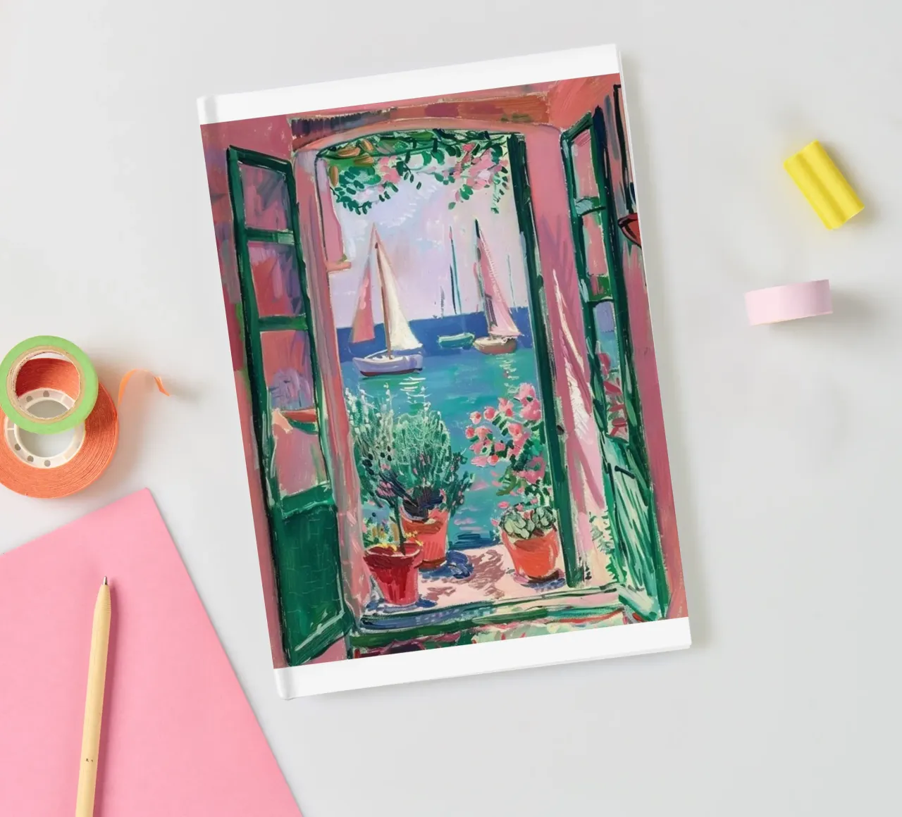 view of a sailboat from behind the window notebook by briyan shop