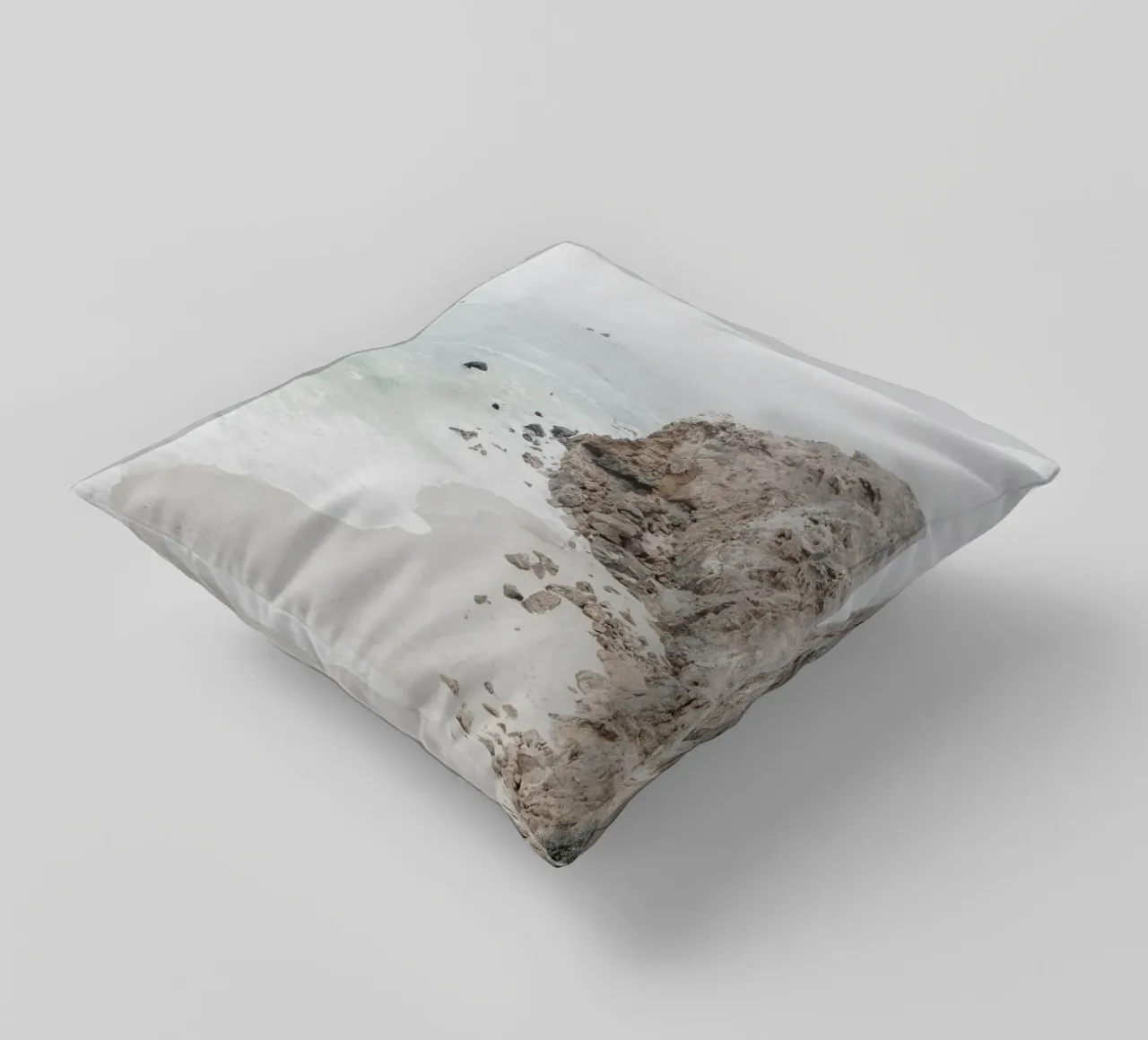 Scogliere e spiaggia costiera cuscino da Indigo Tides Art