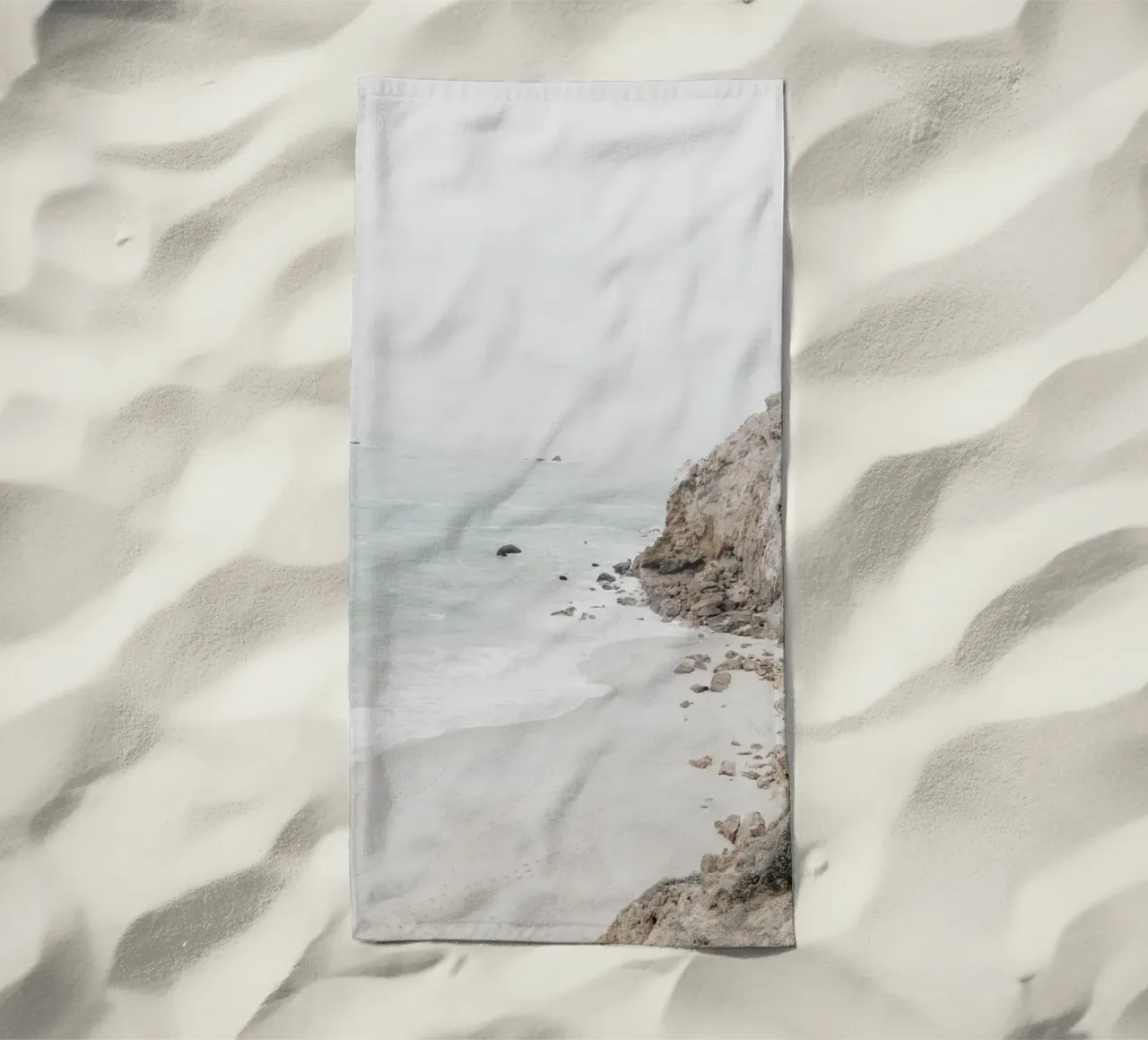 Coastal Cliffs and Beach beach towel by Indigo Tides Art