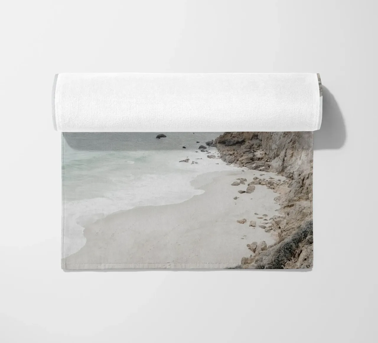 Coastal Cliffs and Beach beach towel by Indigo Tides Art