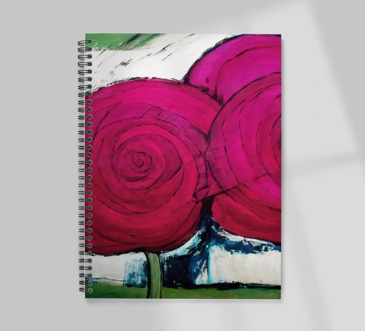 Two roses in pink spiral notebook by Anita Gewald