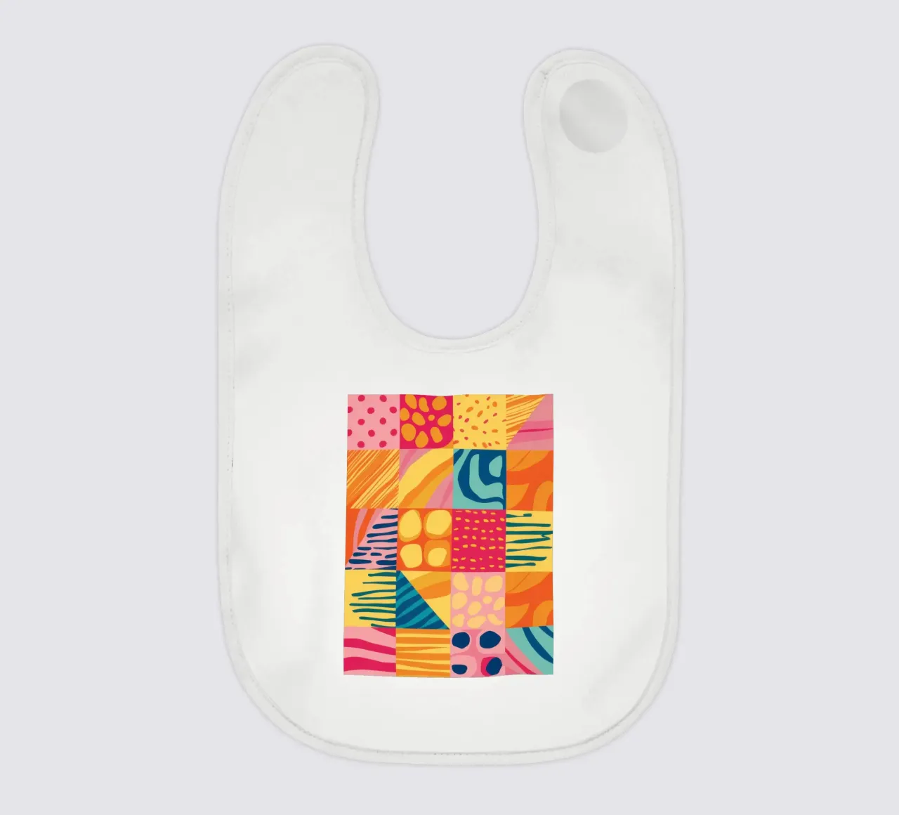 Chromatic Patchwork Joy baby bib by Dream Gesso