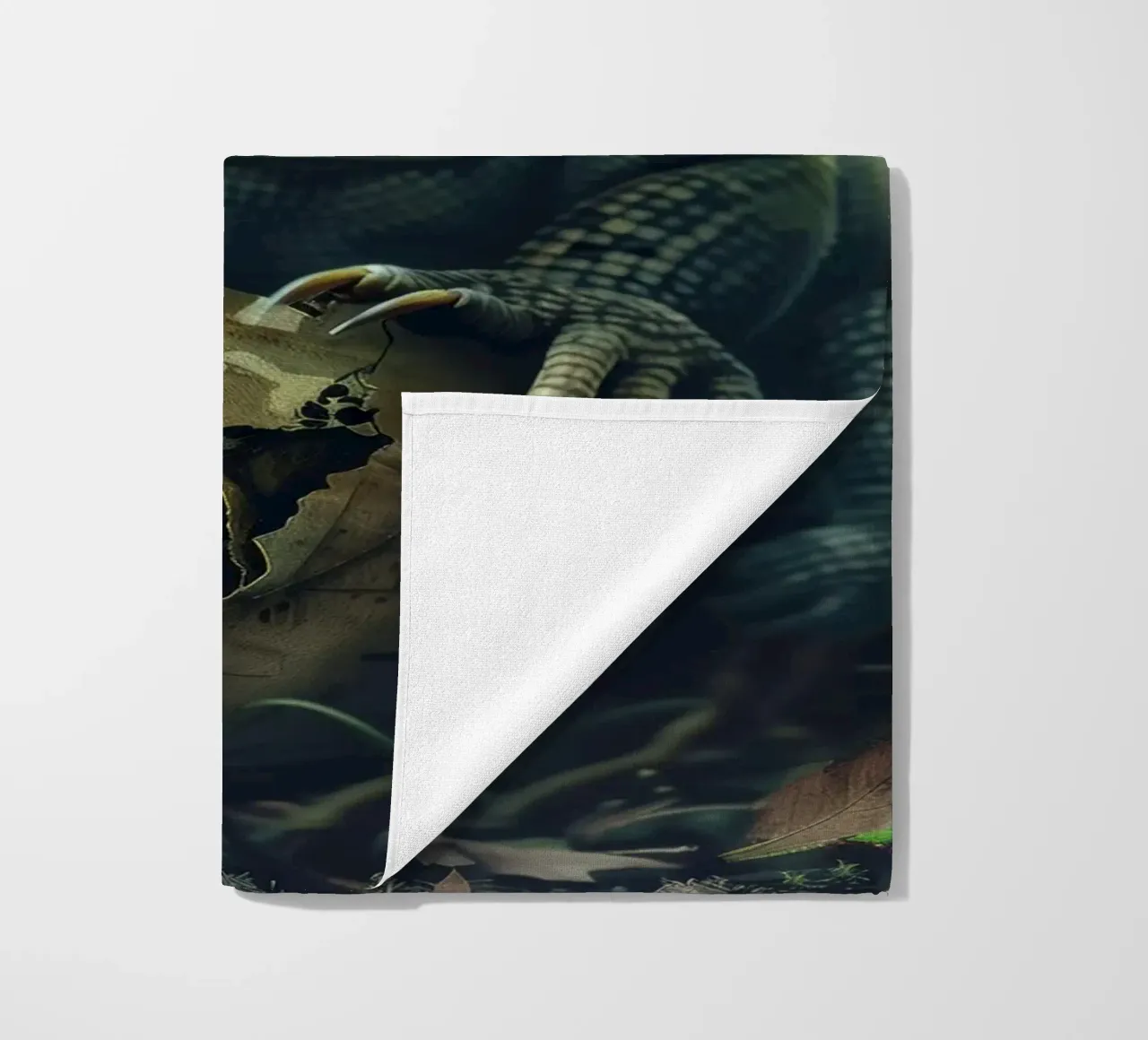 Komodo hatching from egg in a dense forest environment beach towel by DesignDoodle