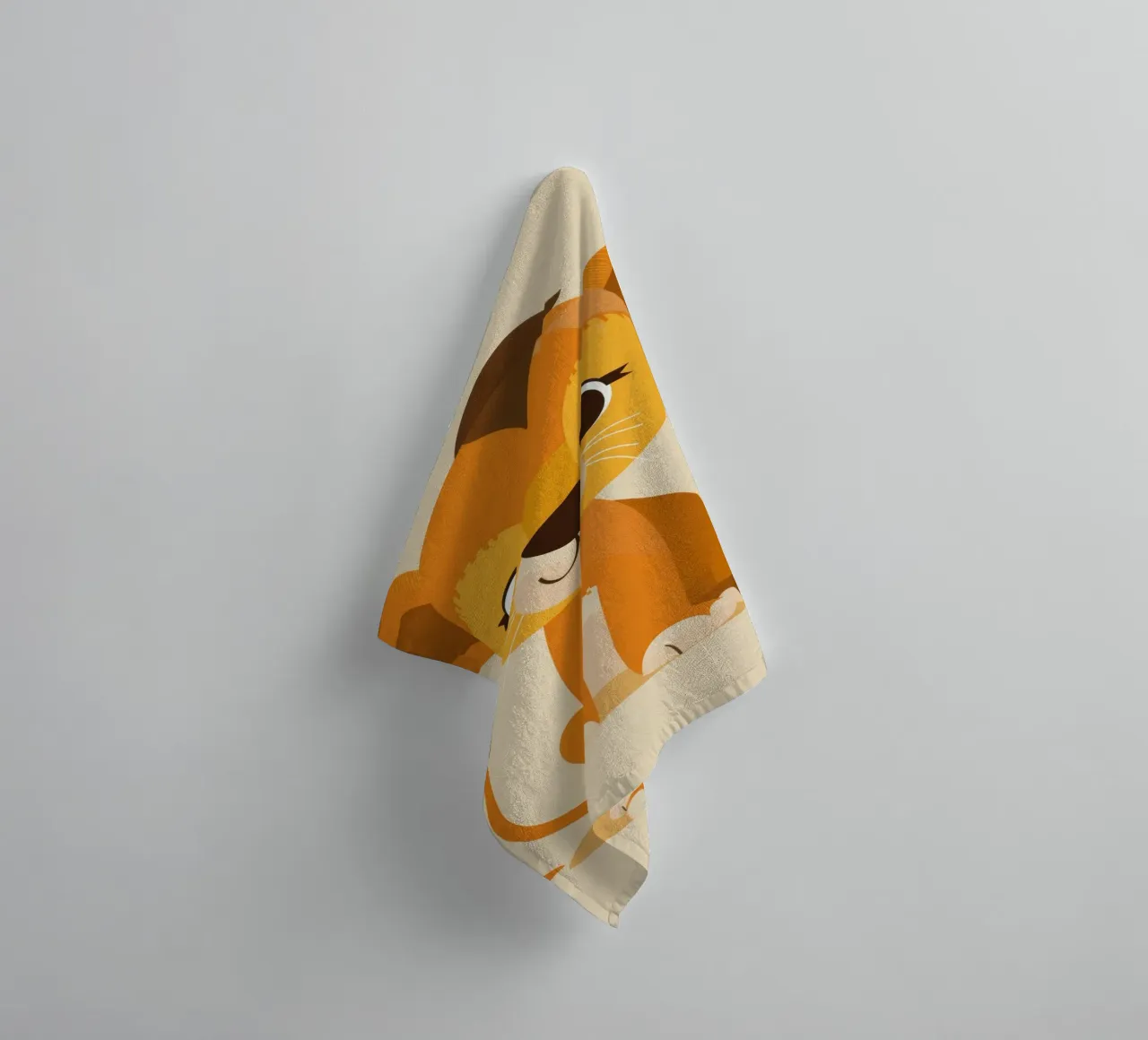 Cartoon lion cub sits playfully against a light background towel by DesignDoodle