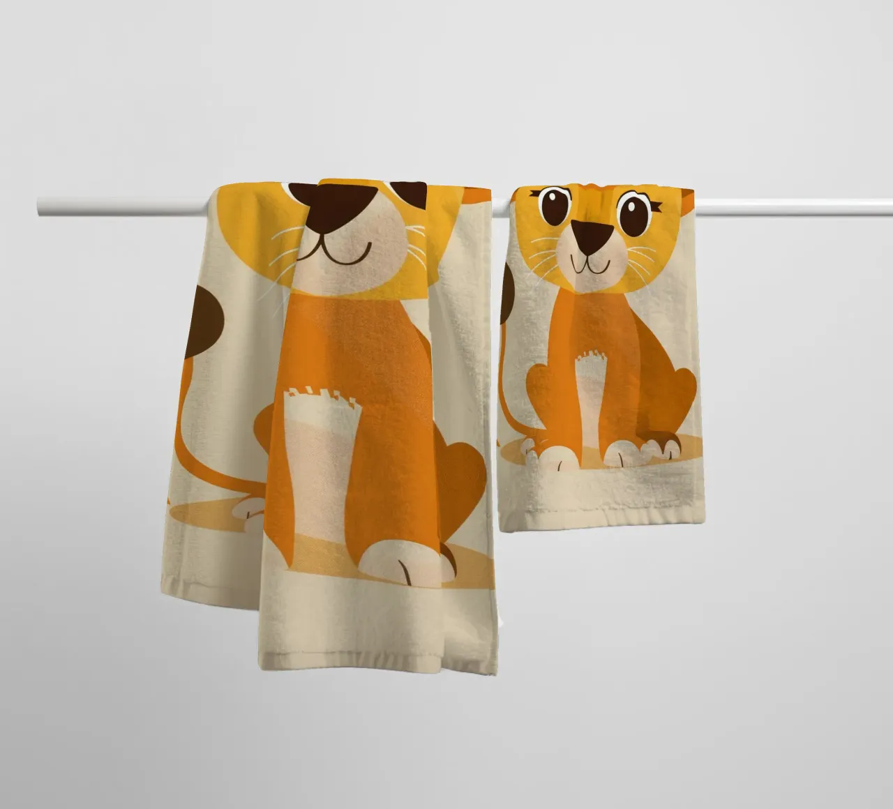 Cartoon lion cub sits playfully against a light background towel by DesignDoodle