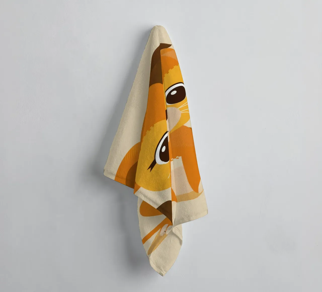 Cartoon lion cub sits playfully against a light background towel by DesignDoodle