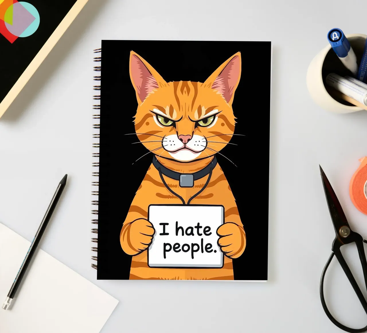 Grumpy Orange spiral notebook by Arjun