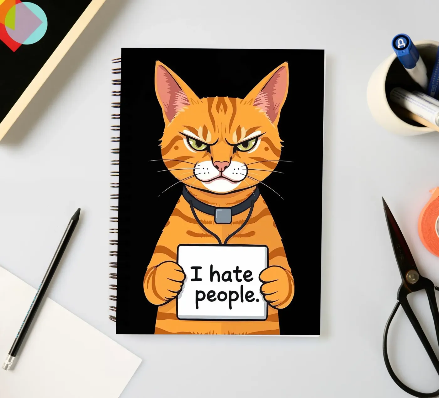 Grumpy Orange spiral notebook by Arjun