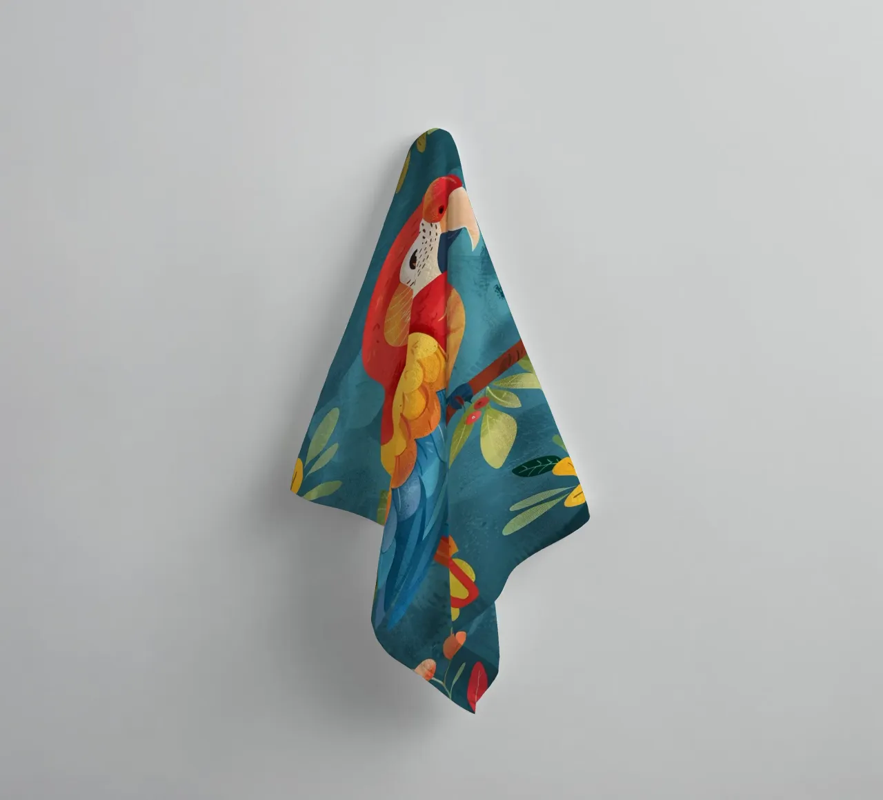 Bunter Ara auf einem Ast inmitten von üppigem Blattwerk Handtuch von DesignDoodle