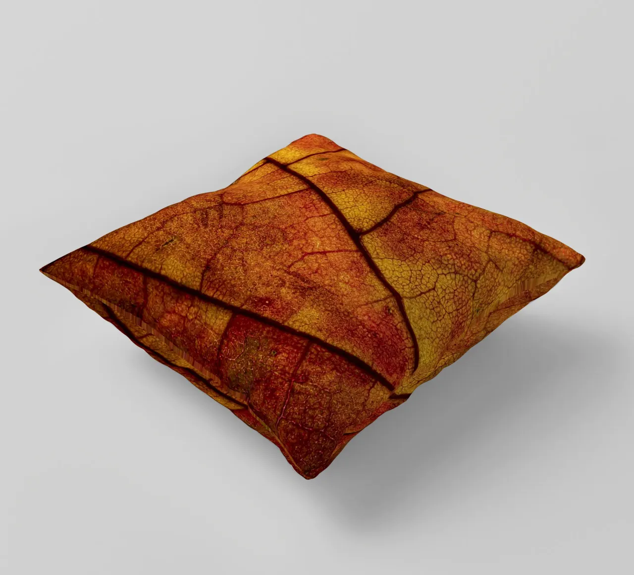 Herbstblatt mit lebendigem Farbverlauf und Aderstruktur cuscino da Bilderwelt - Kunst für die Wand