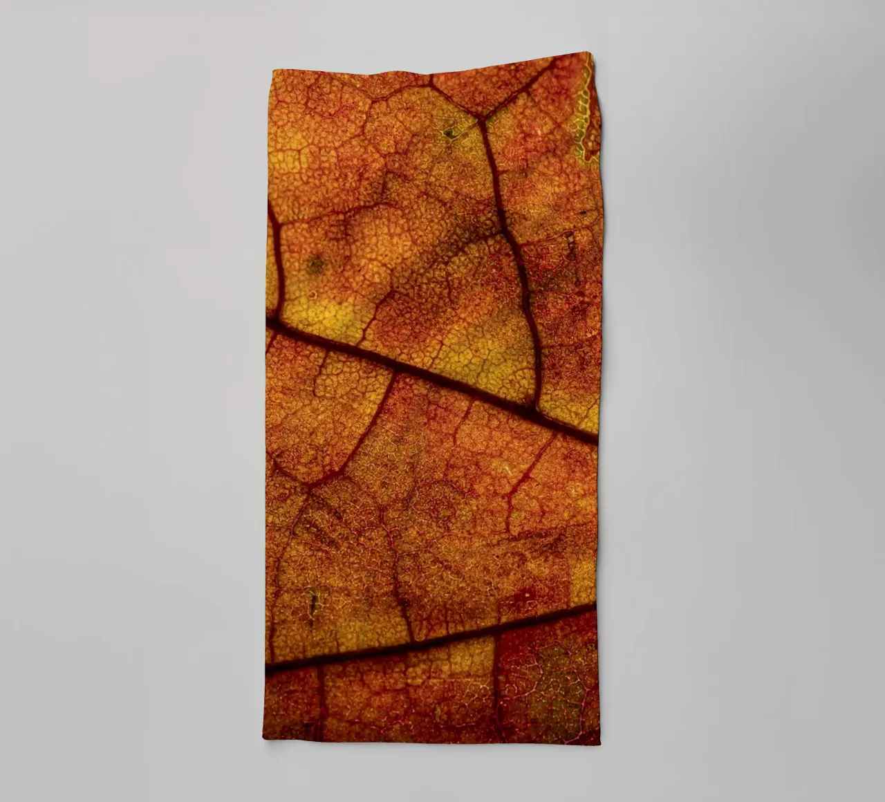 Herbstblatt mit lebendigem Farbverlauf und Aderstruktur asciugamano da bagno da Bilderwelt - Kunst für die Wand