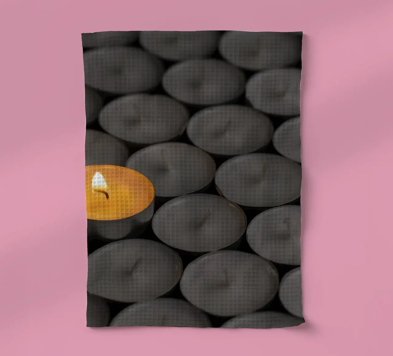 Single candle between dark tea lights tea towel by Bilderwelt - Kunst für die Wand