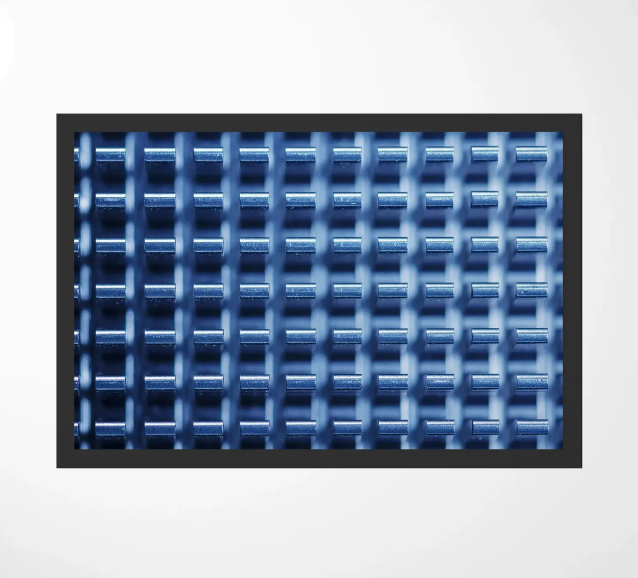 Structure métallique avec ailettes de refroidissement - vue macro paillasson de Bilderwelt - Kunst für die Wand