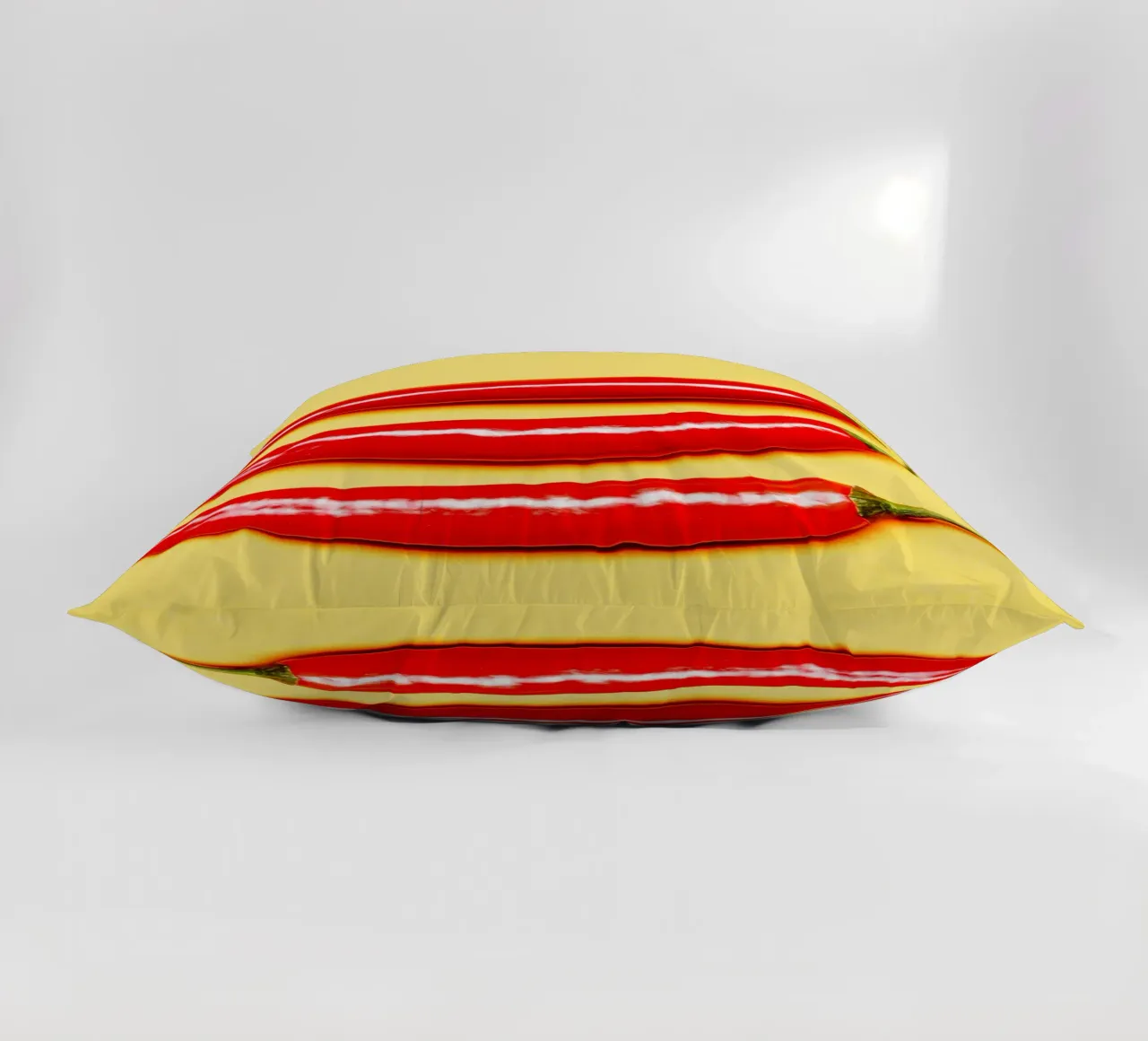 Red chilli peppers on a yellow surface decorative cushion by Bilderwelt - Kunst für die Wand