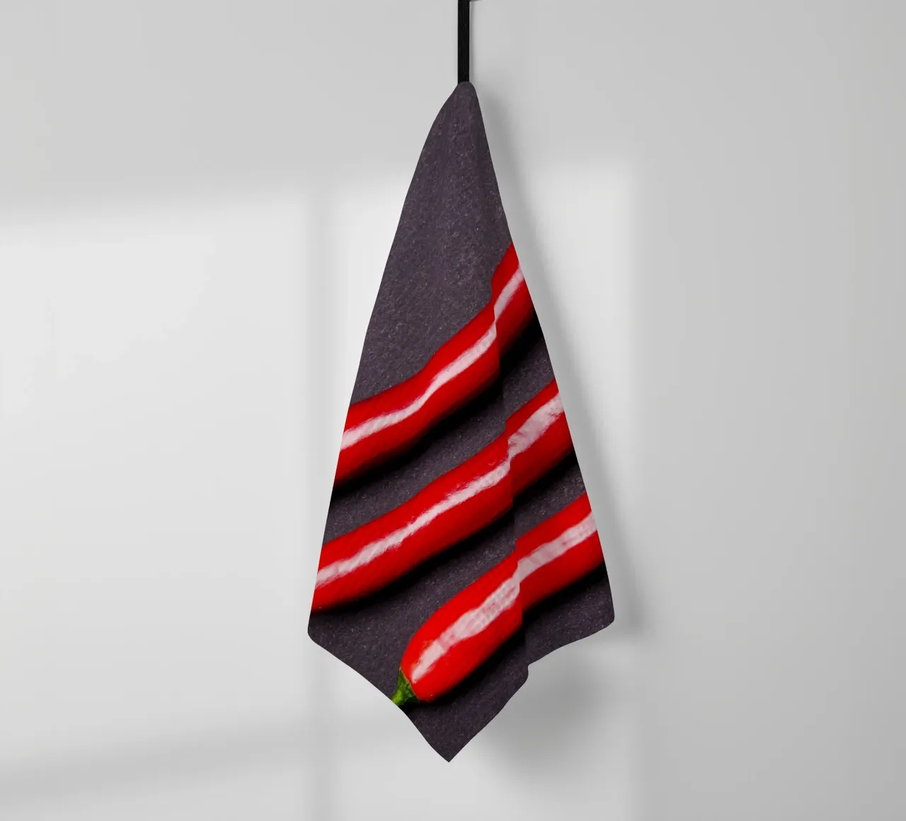 Three chilli peppers on a black background tea towel by Bilderwelt - Kunst für die Wand