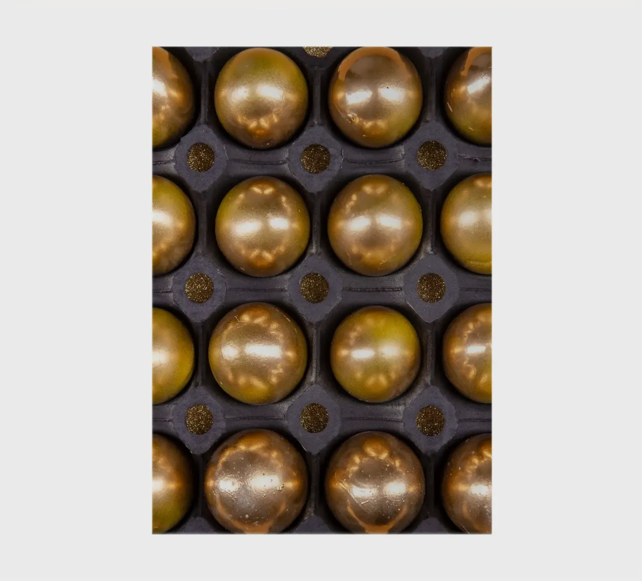 Gold spheres in a symmetrical presentation grid notebook by Bilderwelt - Kunst für die Wand