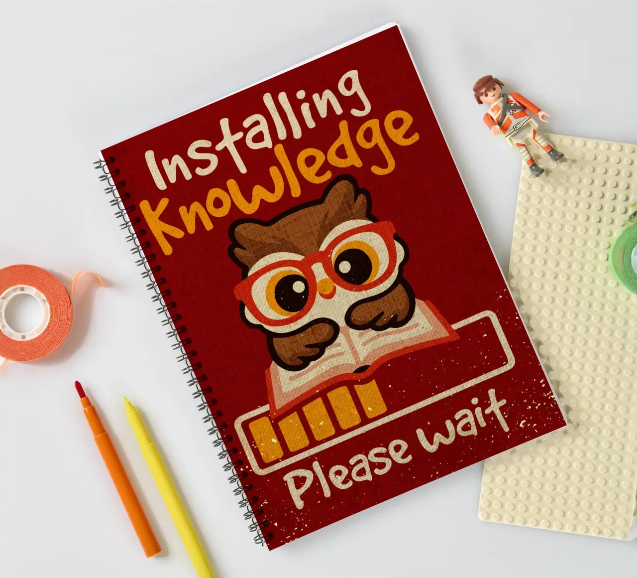 Installing knowledge owl spiral notebook by Andrew S Morrison