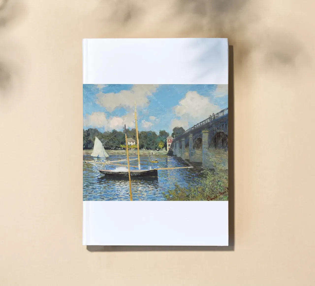 bridge and boat underneath notebook by SMG Store