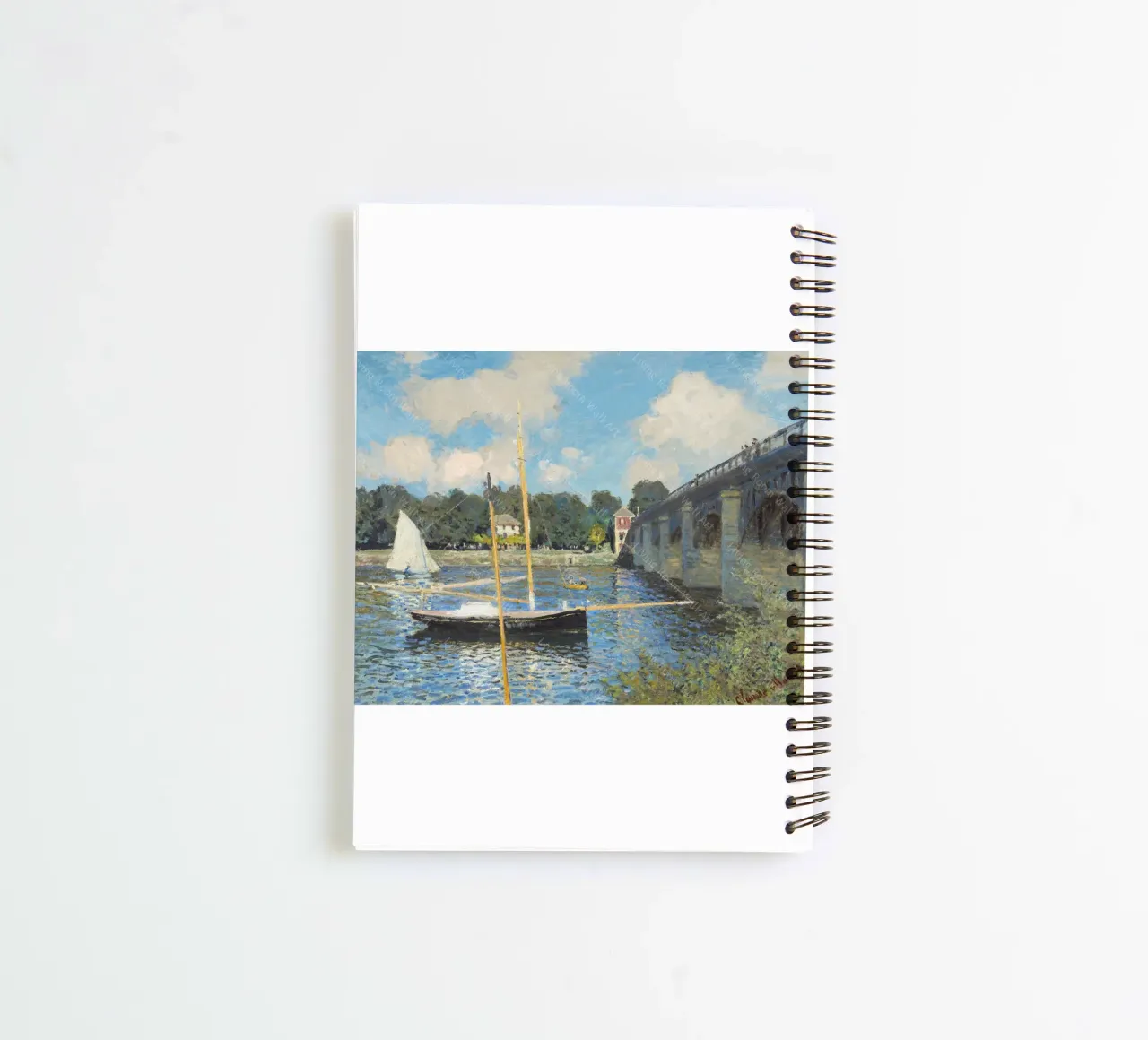 bridge and boat underneath spiral notebook by SMG Store