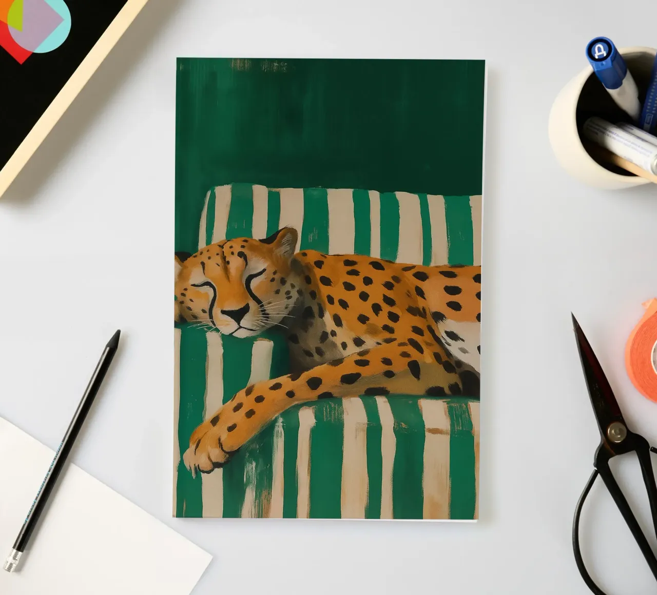 Lazy Cheetah on a Striped Couch notebook by Attaboy Dsgn