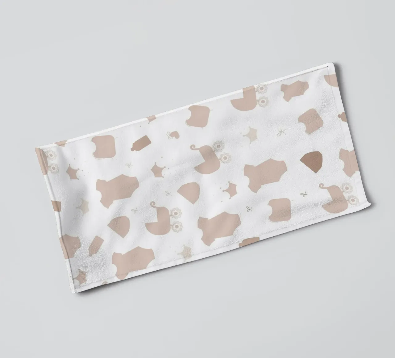 Baby symbol neutral colored pattern towel by gulsengunel
