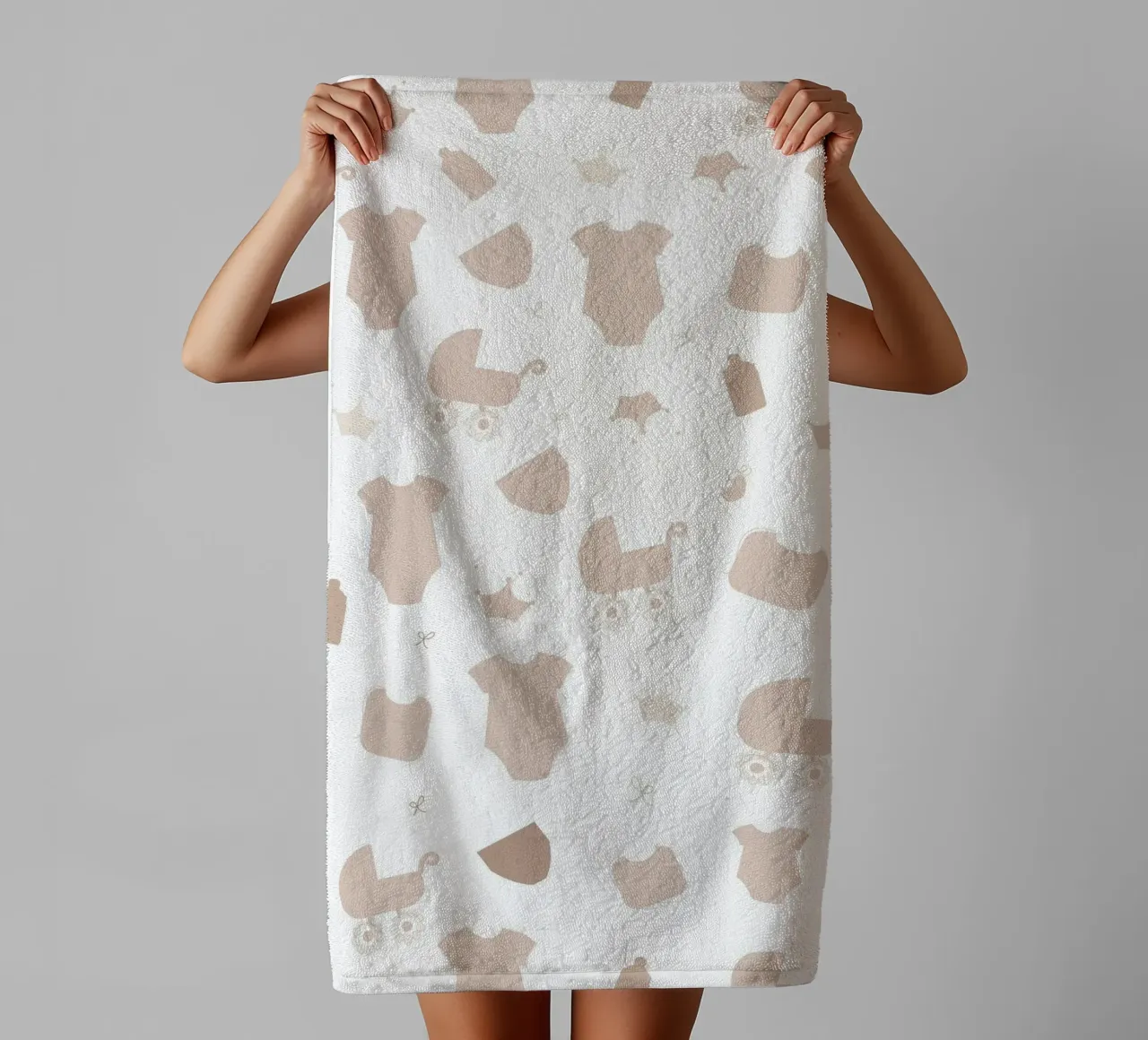 Baby symbol neutral colored pattern towel by gulsengunel