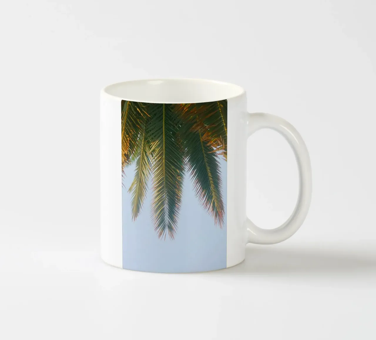 fronda di palma tazza in ceramica da Earthly Visions