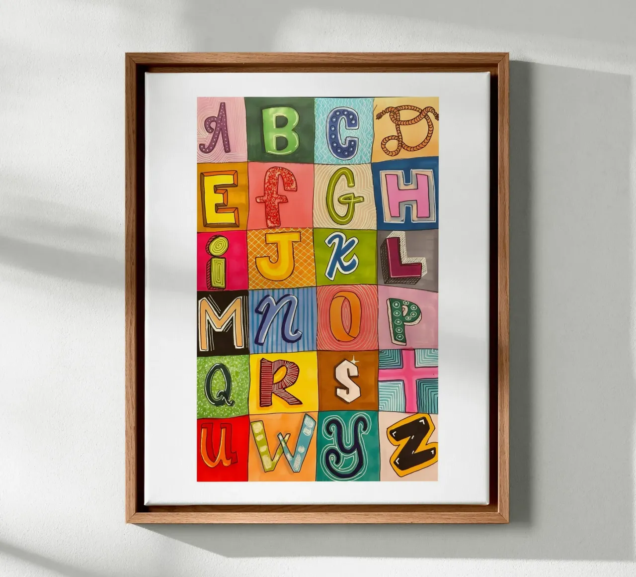 Buntes Alphabet-Raster Leinwand mit Schattenfugenrahmen von Olivia Creator