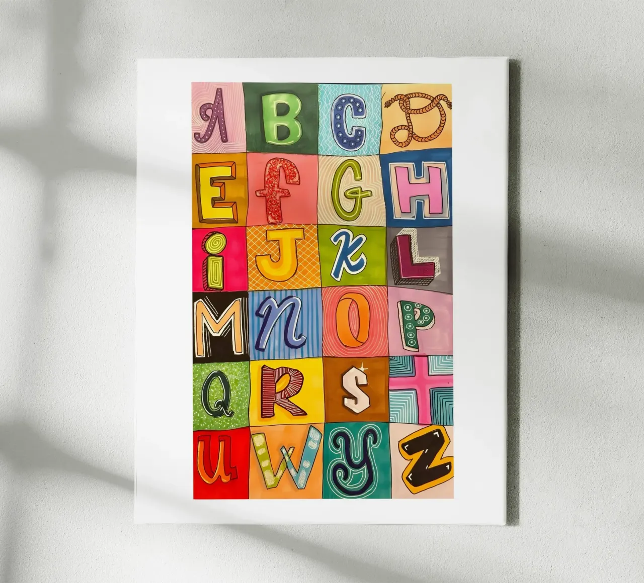 Buntes Alphabet-Raster Leinwand mit Schattenfugenrahmen von Olivia Creator
