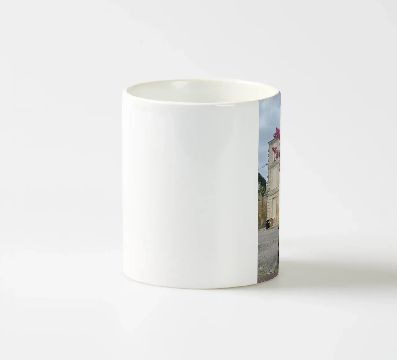 Motorbike in front of a beige house with a flowering shrub in France ceramic mug by Sous le ciel
