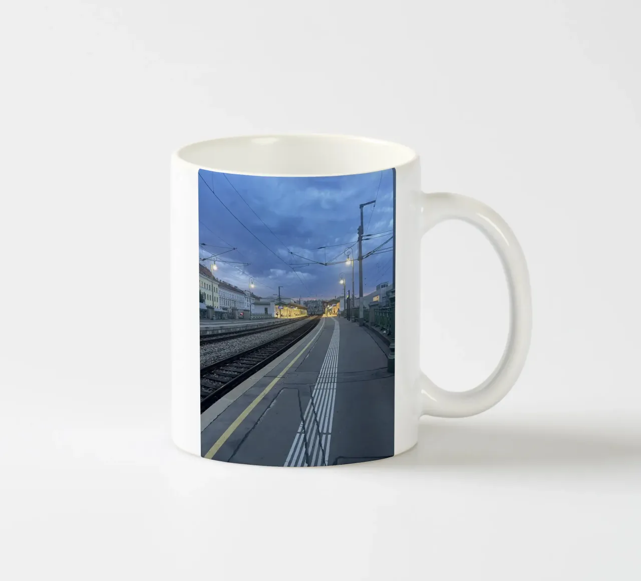 Railway station in Vienna under an overcast sky ceramic mug by Sous le ciel
