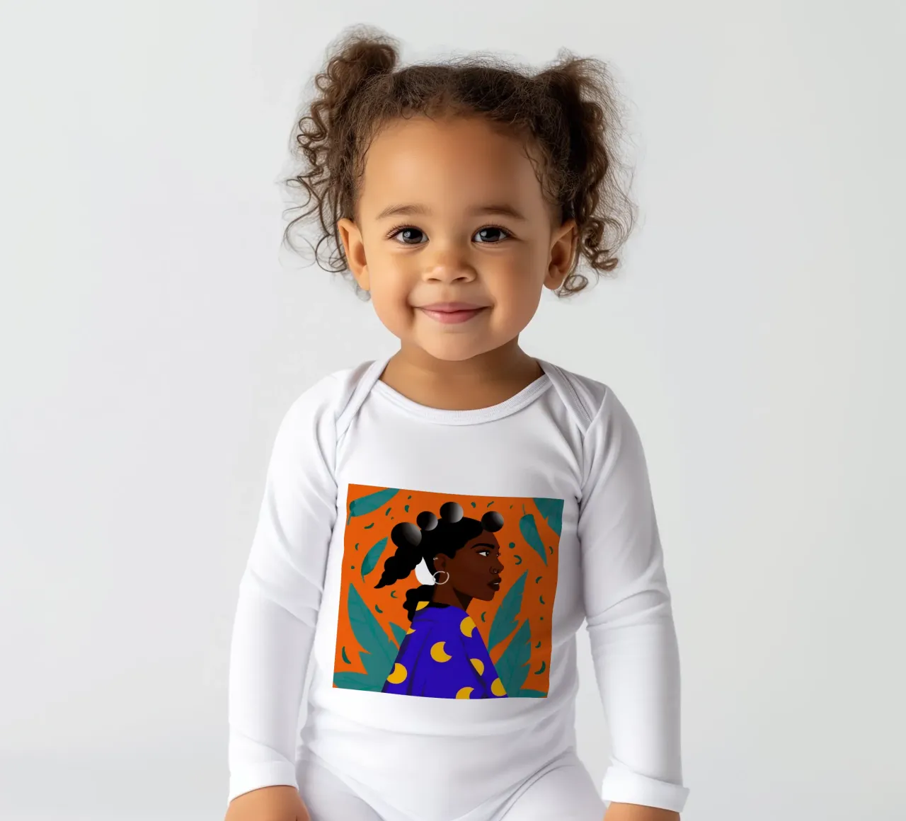 Saffron Serene Gaze long-sleeve baby romper by Prism Ritual