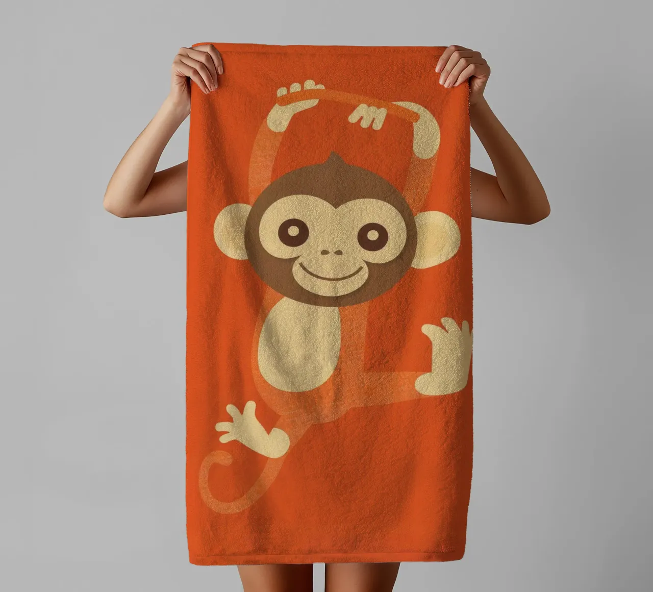 Playful monkey swings happily, showcasing energy and joy towel by DesignDoodle