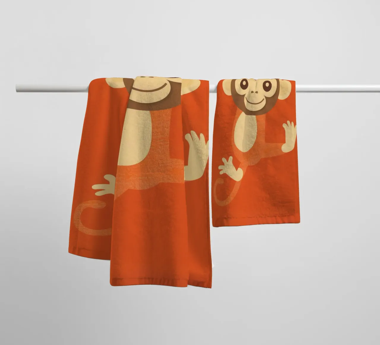 Playful monkey swings happily, showcasing energy and joy towel by DesignDoodle