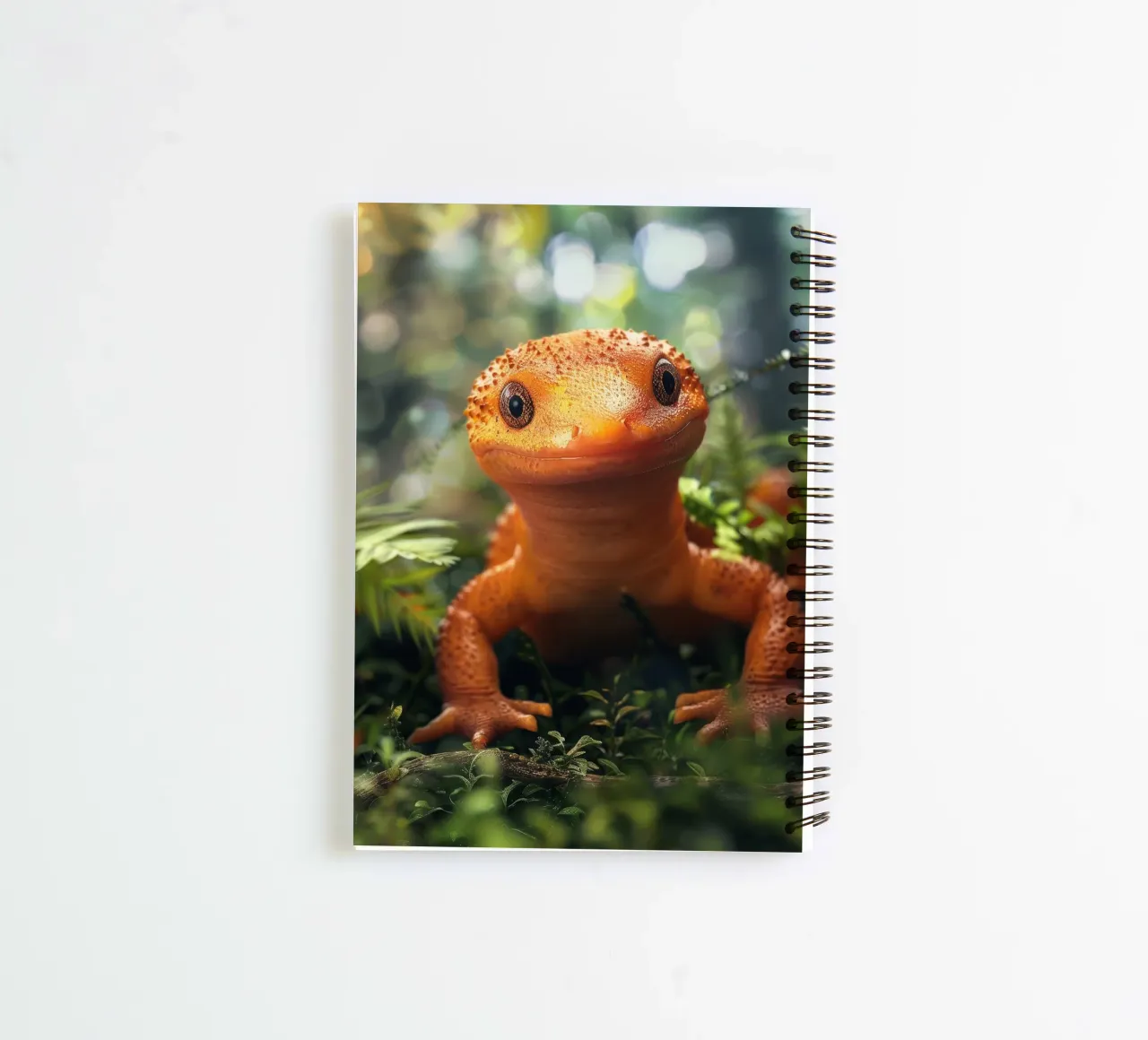 Bright orange lizard perched among lush foliage in a forest spiral notebook by DesignDoodle