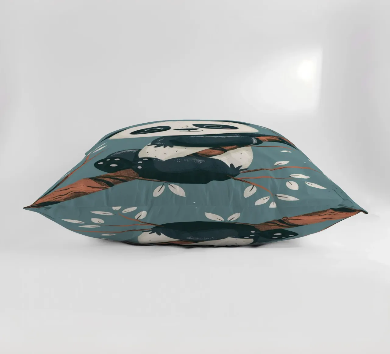 Cute panda sitting on a tree branch surrounded by leaves in decorative cushion by DesignDoodle